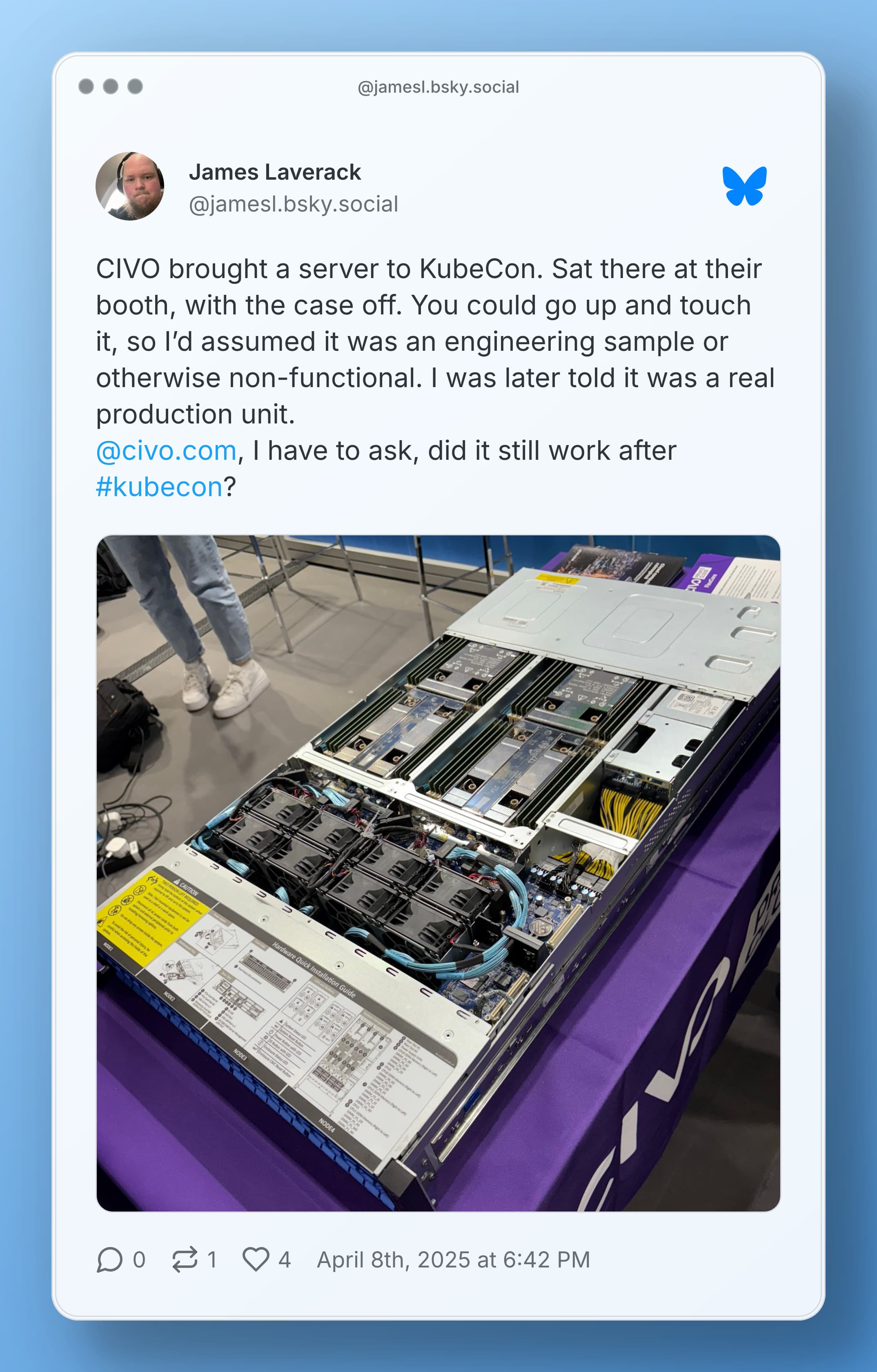 A screenshot of a Bluesky post from @jamesl.bsky.social. The text reads: "CIVO brought a server to KubeCon. Sat there at their booth, with the case off. You could go up and touch it, so I’d assumed it was an engineering sample or otherwise non-functional. I was later told it was a real production unit. @civo.com , I have to ask, did it still work after #kubecon?". The image below shows a rack server with the lid removed, showing the internals.